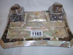 A mother of pearl ink stand