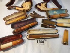 A fantastic collection of Victorian smoking memorabilia including 8 cigarette holders (1 with 9ct