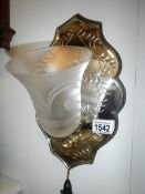 A cut glass gypsy mirror wall light