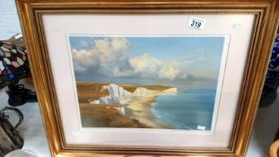 A framed Frank Wootton limited edition print 'Along the Seven Sisters' signed