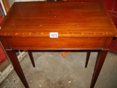 An Edwardian inlaid side table