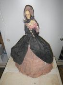 An antique doll,