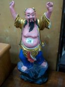 A large carved wood Chinese figure