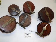 6 vintage wooden spine back reels