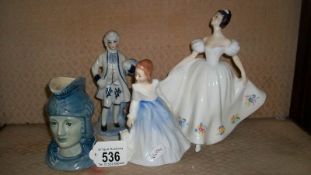 2 Royal Doulton figurines being Kate and Andrea,