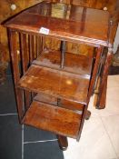 A Victorian revolving Canterbury book case with reading lecturn