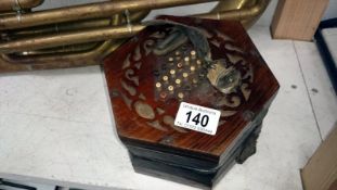 A Victorian rosewood queeze box,