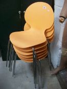 A set of 6 retro style chairs with chrome legs