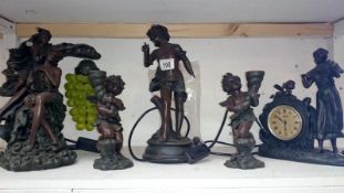 A mixed lot of bronzed resin cherubs, figures, clock, candlesticks, lamp etc,