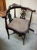 A Victorian inlaid corner chair