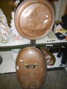 A large Victorian copper foot warmer and a Victorian warming pan