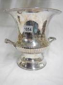 A silver plated champagne bucket