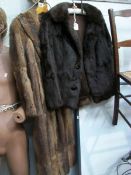 2 fur coats,