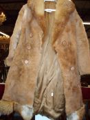 A vintage circa 1970's genuine kangaroo fur coat