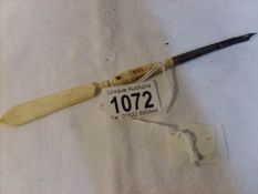 A Victorian bone dip pen / letter opener with Stanhope of Dieppe
