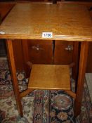 An oak arts and crafts 2 tier table