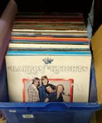 A box of LP records and a box of 45 rpm records including Rolling Stones, Spandau Ballet,
