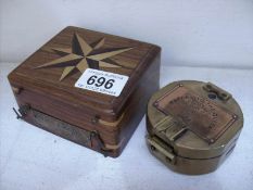 A geographic compass in inlaid box