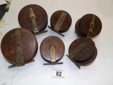 6 vintage wooden spine back reels