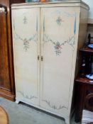 A French floral painted double wardrobe