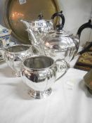A four piece silver plated tea set