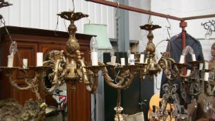A pair of 8 lamp chandeliers