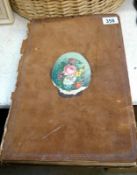 A mid 19th century scrap book with many plates and pictures