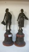 A pair of good spelter figures in the form of fisher folk, approx.