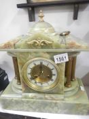 A 19th century green marble pediment clock,