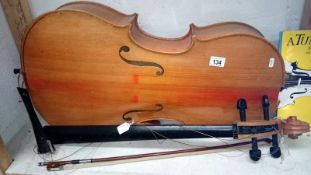 An old cello with bow,