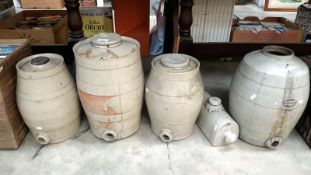 4 stoneware barrels and a hot water bottle