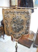 A Victorian adjustable pole screen with beadwork panel