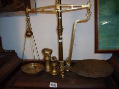 A set of 'Banfield' brass balance scales and weights