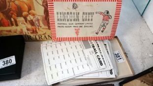 A Lincoln City football book and vintage football scratch cards