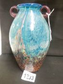 A Dale Tiffany vase, aqua blue with gold copper fleck, 8" tall,