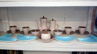 A Poole pottery coffee set and 4 dishes