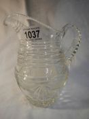 A circa 18th century heavy cut glass water jug
