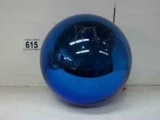 A large blue bauble