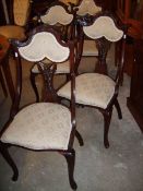 A set of 4 Victorian dining chairs