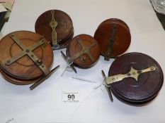 5 vintage wooden reels including 2 star backs