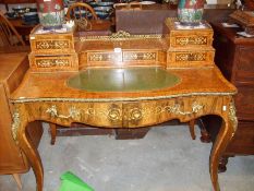 A superb 19th century burr walnut ladies writing table with leather inset top,