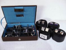 A collection of approximately 14 pairs of cuff links