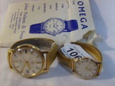 A matching pair of ladies and gents Omega wristwatches with paperwork