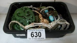 A box of costume jewellery including Jade item