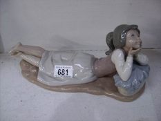 A NAO figure of a reclining girl