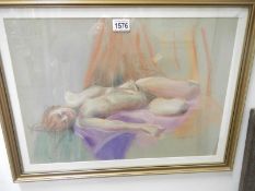 A pastel on paper of a reclining nude by Bernard John Hines, signed and dated 1979,