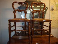 A fine pair of Victorian bedroom chairs with cane seats,