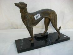 A spelter figure of a dog