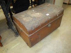 A large old tin trunk