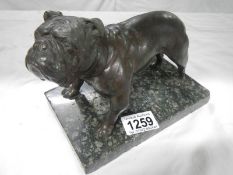 A bronze bulldog on marble base (signature on collar)